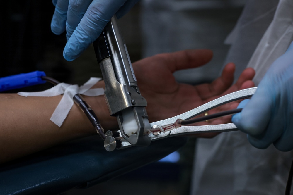 U.S. Marines volunteer at Camp Hansen Blood Drive