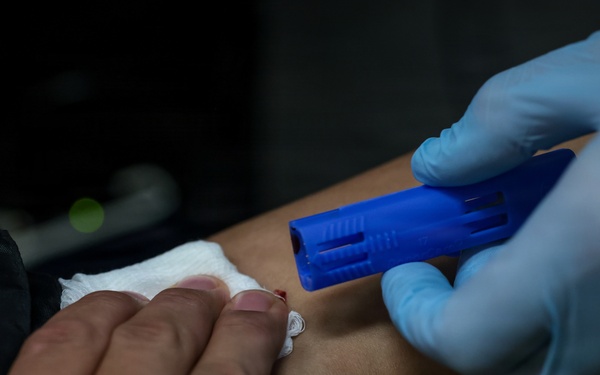 U.S. Marines volunteer at Camp Hansen Blood Drive