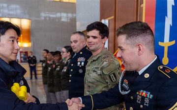 1st Signal Brigade HHC conducts taekwondo yellow belt promotion and recognition