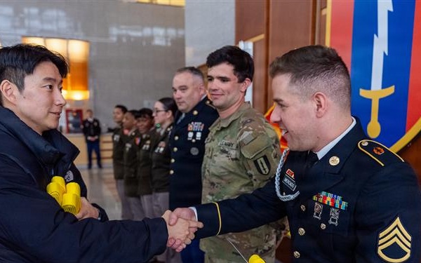 1st Signal Brigade HHC conducts taekwondo yellow belt promotion and recognition