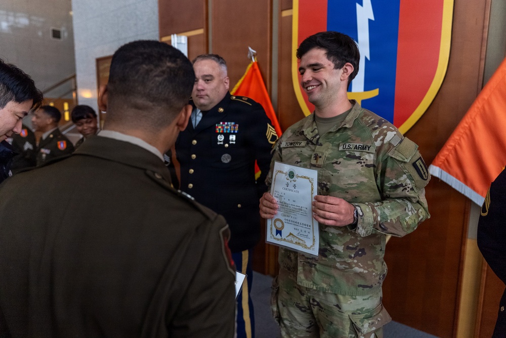 1st Signal Brigade HHC conducts taekwondo yellow belt promotion and recognition