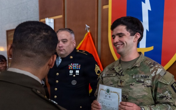 1st Signal Brigade HHC conducts taekwondo yellow belt promotion and recognition