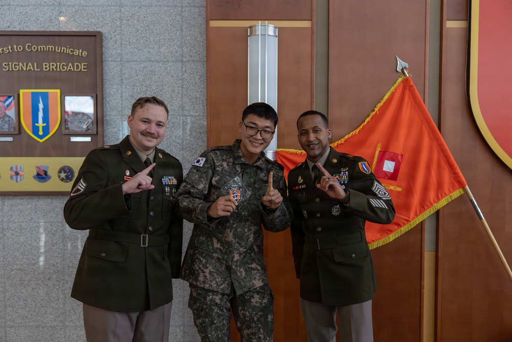 1st Signal Brigade HHC conducts taekwondo yellow belt promotion and recognition