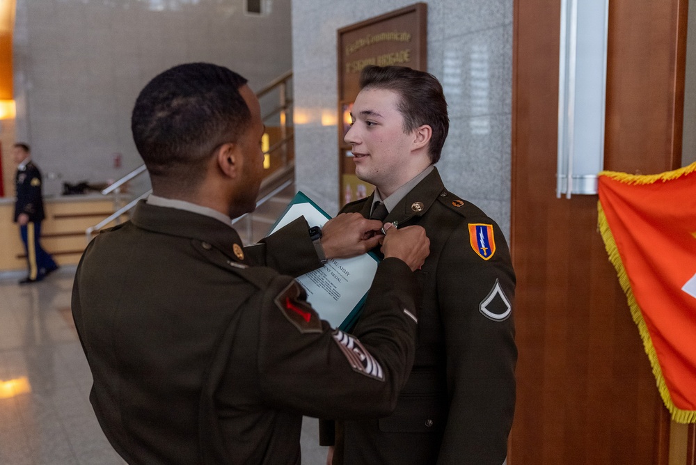 1st Signal Brigade HHC conducts taekwondo yellow belt promotion and recognition