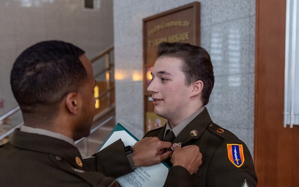 1st Signal Brigade HHC conducts taekwondo yellow belt promotion and recognition