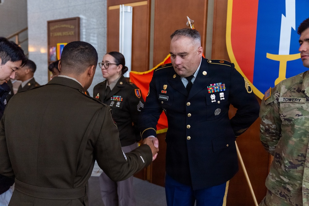 1st Signal Brigade HHC conducts taekwondo yellow belt promotion and recognition