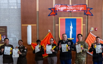 1st Signal Brigade HHC conducts taekwondo yellow belt promotion and recognition