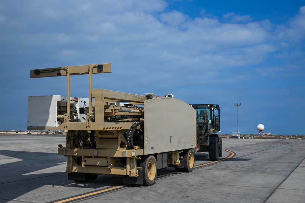 449th AEG Airmen support regional mobility operations through cargo offload
