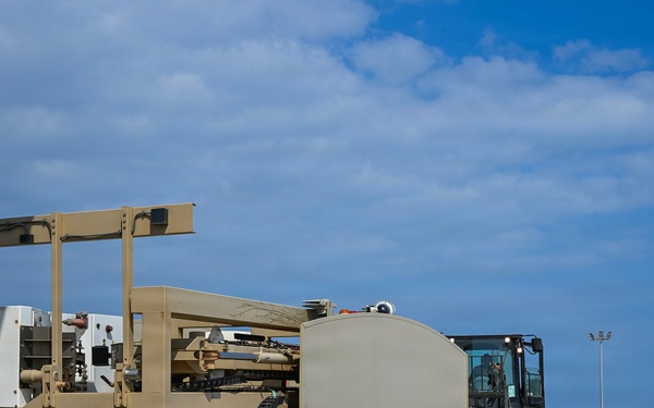 449th AEG Airmen support regional mobility operations through cargo offload