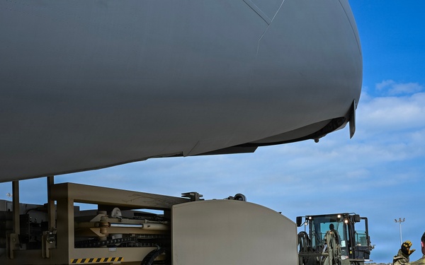 449th AEG Airmen support regional mobility operations through cargo offload