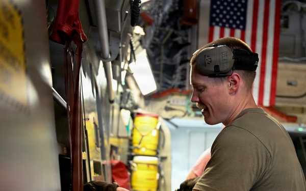 449th AEG Airmen support regional mobility operations through cargo offload