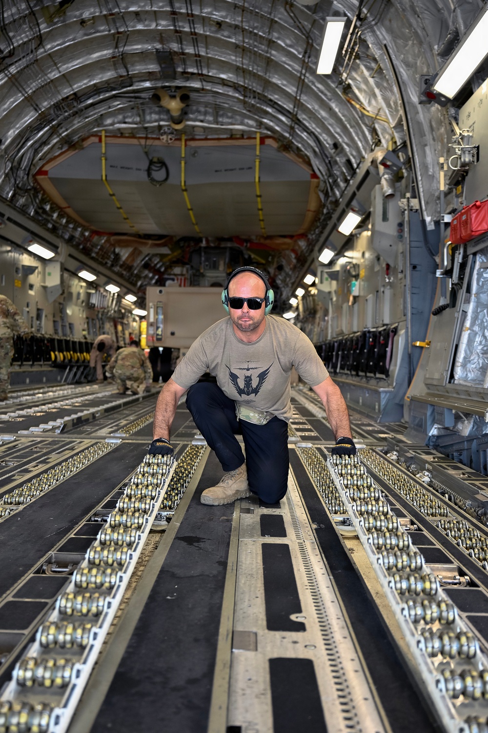 449th AEG Airmen support regional mobility operations through cargo offload