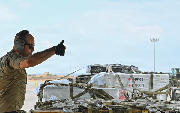 449th AEG Airmen support regional mobility operations through cargo offload