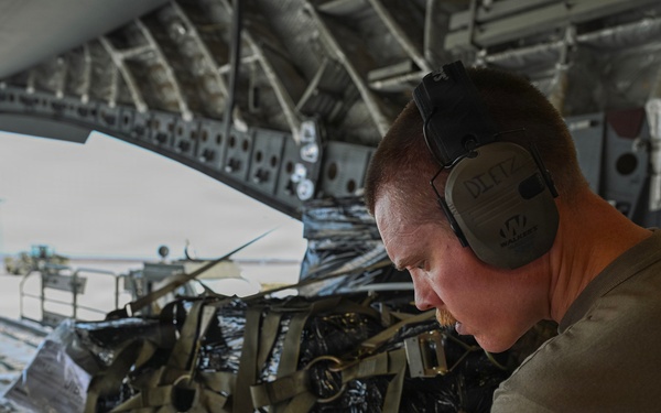 449th AEG Airmen support regional mobility operations through cargo offload
