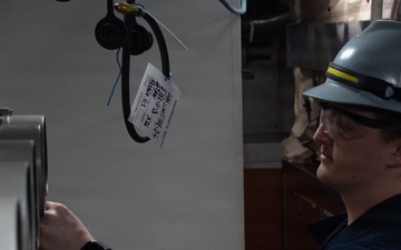 Ronald Reagan Sailors and Contractors Perform Maintenance