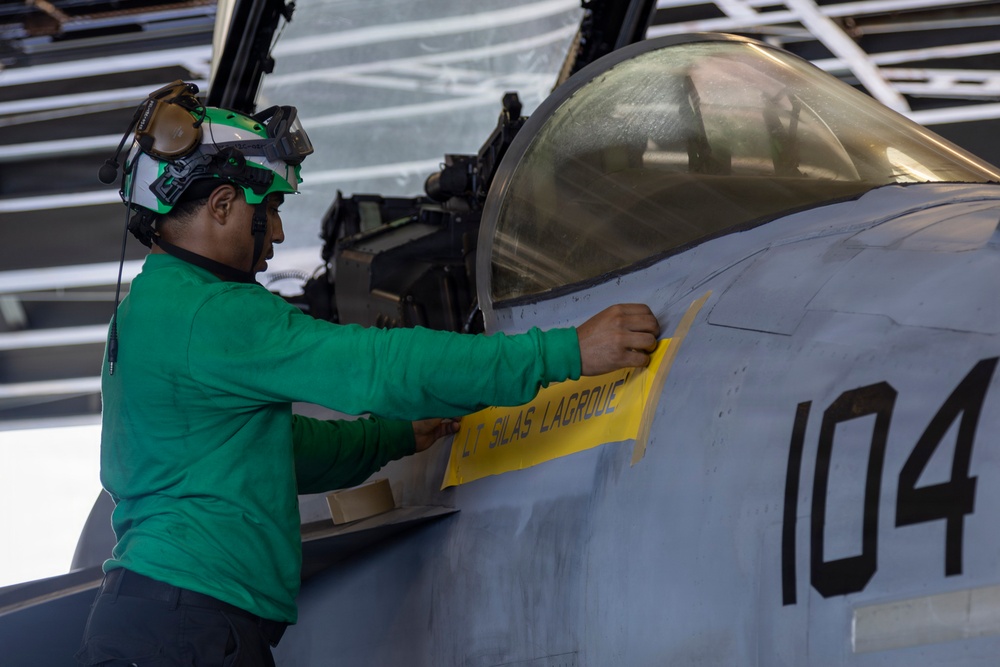 Abraham Lincoln conducts routine aircraft maintenance