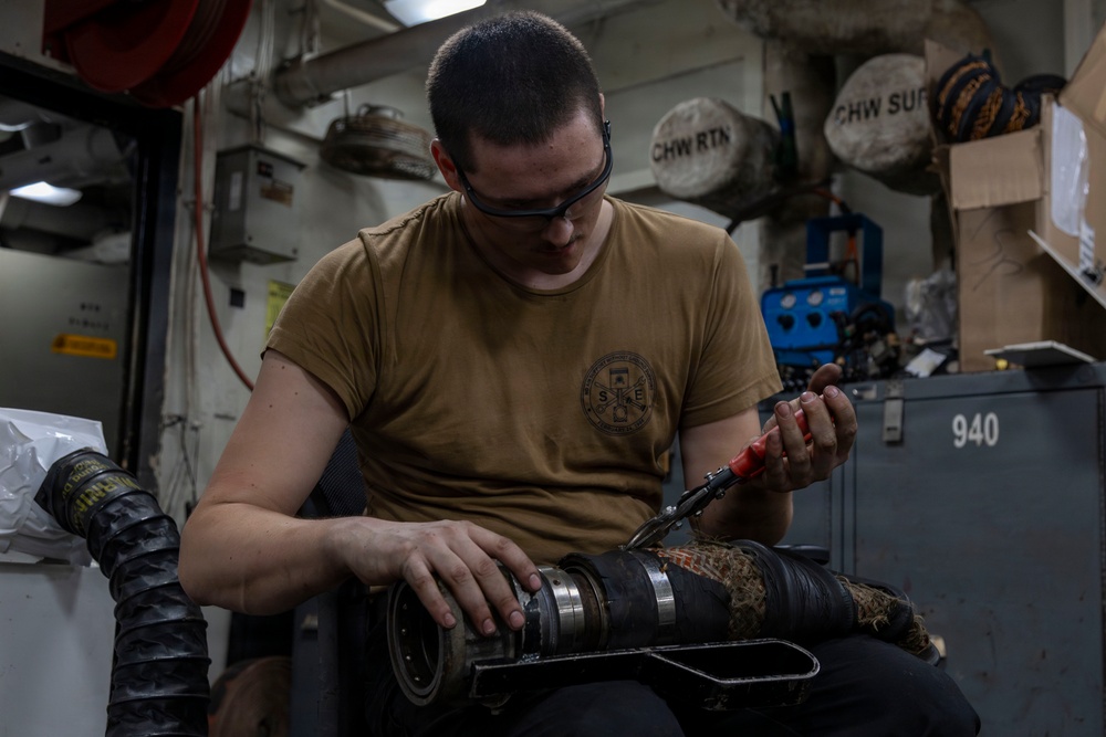 Abraham Lincoln conducts routine maintenance