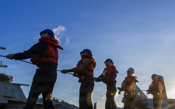 Abraham Lincoln conducts replenishment-at-sea with Yukon