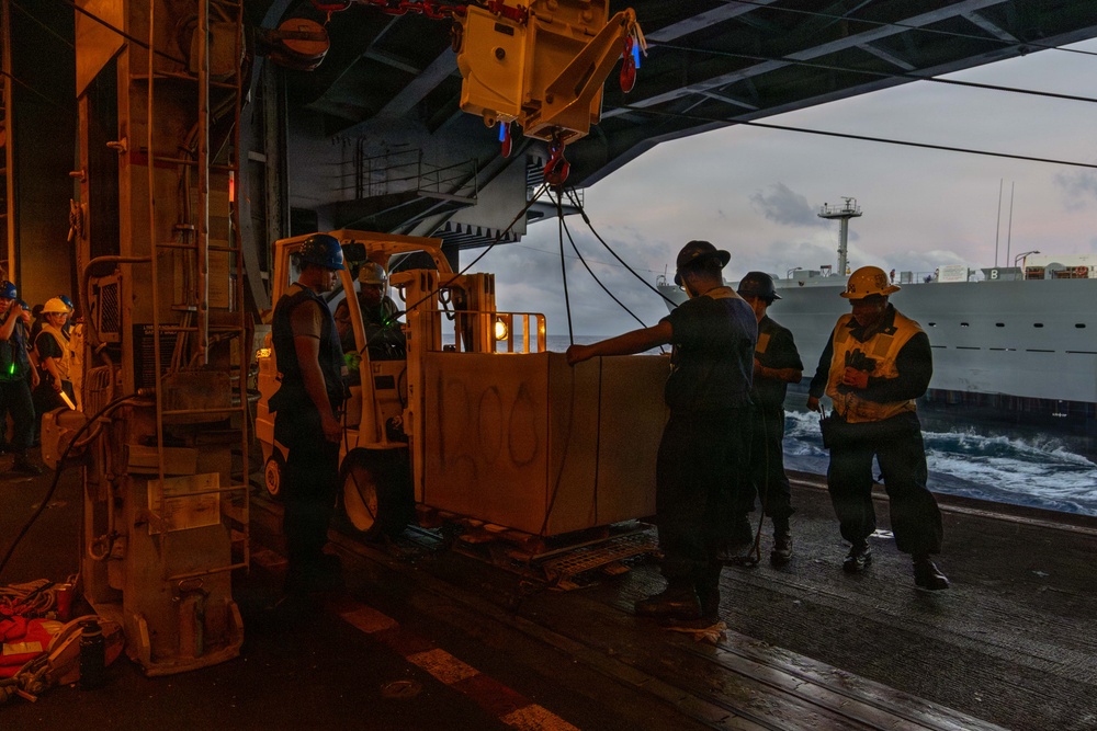 Abraham Lincoln conducts replenishment-at-sea with Yukon