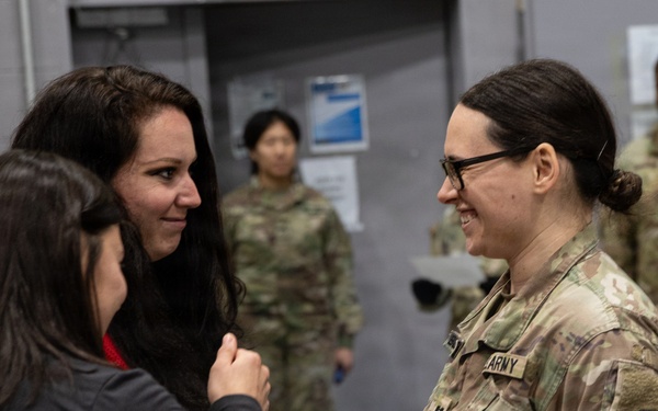 Newly Promoted Captain Administers Oath to Fellow Officer at 30th Medical Brigade Ceremony