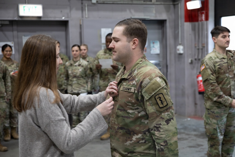 Newly Promoted Captain Administers Oath to Fellow Officer at 30th Medical Brigade Ceremony