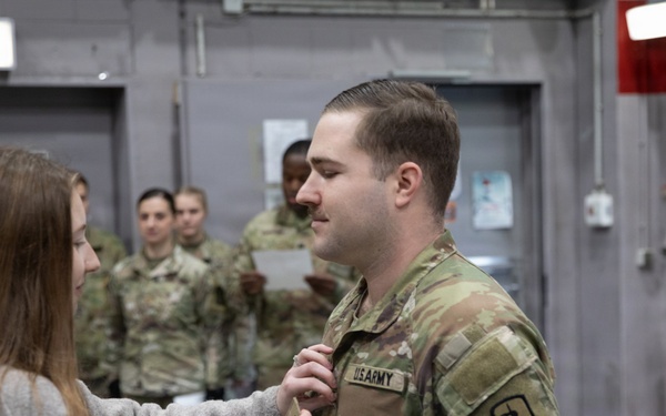 Newly Promoted Captain Administers Oath to Fellow Officer at 30th Medical Brigade Ceremony