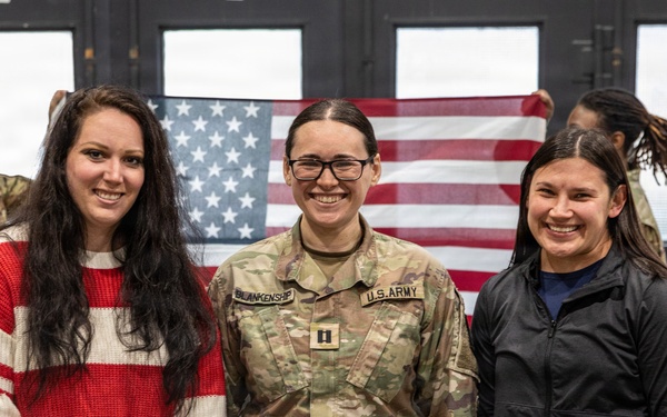 Newly Promoted Captain Administers Oath to Fellow Officer at 30th Medical Brigade Ceremony
