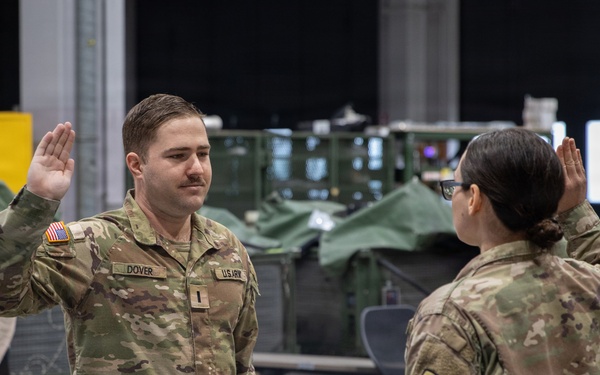 Newly Promoted Captain Administers Oath to Fellow Officer at 30th Medical Brigade Ceremony