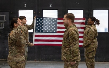 Newly Promoted Captain Administers Oath to Fellow Officer at 30th Medical Brigade Ceremony