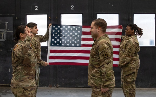 Newly Promoted Captain Administers Oath to Fellow Officer at 30th Medical Brigade Ceremony