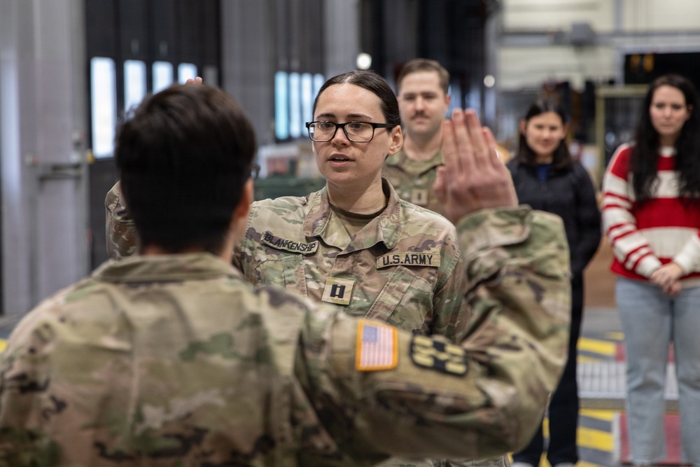 Newly Promoted Captain Administers Oath to Fellow Officer at 30th Medical Brigade Ceremony