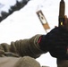 U.S. Army Sgt. Jehiel Jackson Reloads his pistol during a pistol qualification