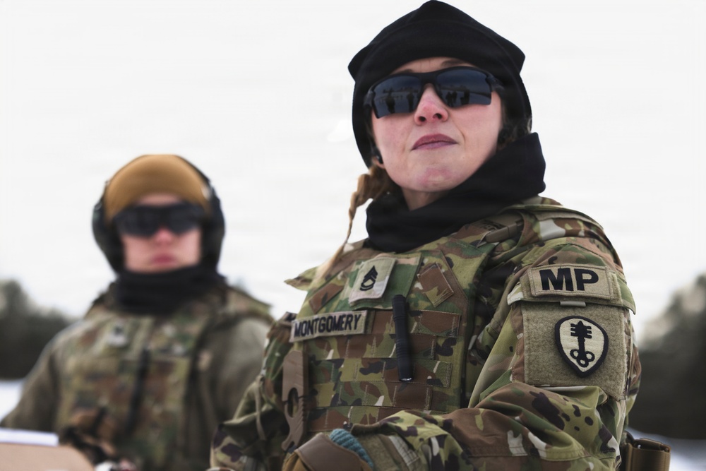 U.S. military police test marksmanship during weapons qualification in Adazi, Latvia