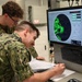 Electronics Technician students troubleshoot the T-1 radar trainer