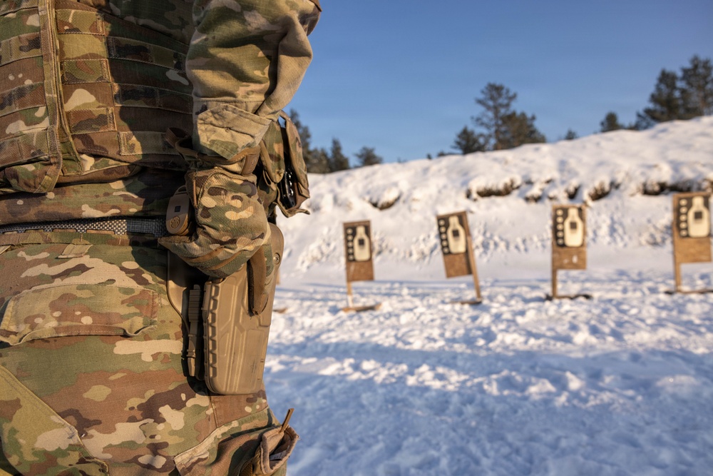 U.S. Soldier conducts rifle-to-pistol transition drill in Latvia