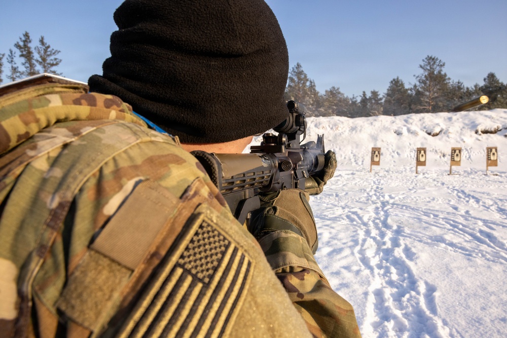 U.S. Soldier Fires M4 Carbine During Weapons Qualification in Latvia