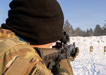 U.S. Soldier Fires M4 Carbine During Weapons Qualification in Latvia
