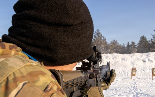 U.S. Soldier Fires M4 Carbine During Weapons Qualification in Latvia