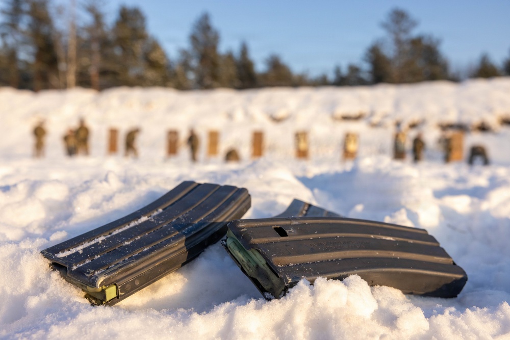Soldiers Fire in the Snow During Law Enforcement Weapons Training in Latvia