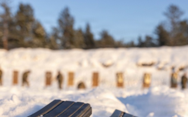 Soldiers Fire in the Snow During Law Enforcement Weapons Training in Latvia