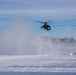 Polish AH-64 Apache land in a swirl of snow at Winter Falcon 26