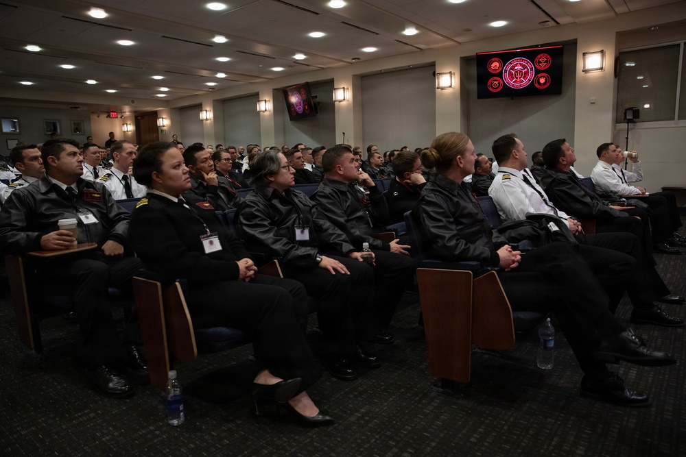 Rear Adm. T. J. Zerr speaks during WTI Re-Blue 2026