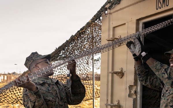 U.S. Marine Corps reservists with MWSS 472 undergo a food inspection for the Major General William Pendleton Thompson Hill Food Service Award