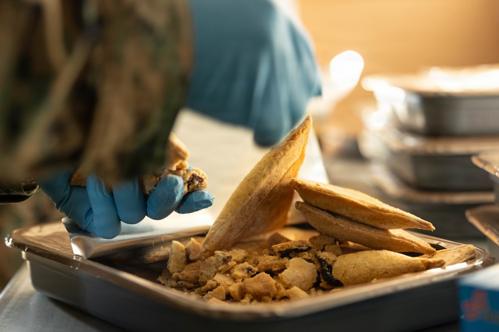 U.S. Marine Corps reservists with MWSS 472 undergo a food inspection for the Major General William Pendleton Thompson Hill Food Service Award