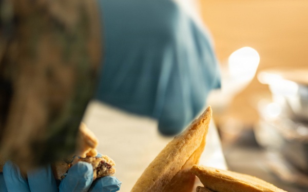 U.S. Marine Corps reservists with MWSS 472 undergo a food inspection for the Major General William Pendleton Thompson Hill Food Service Award