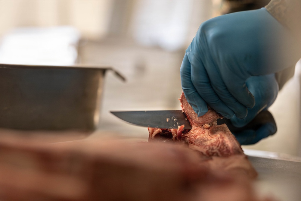 U.S. Marine Corps reservists with MWSS 472 undergo a food inspection for the Major General William Pendleton Thompson Hill Food Service Award