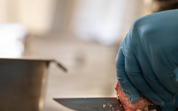 U.S. Marine Corps reservists with MWSS 472 undergo a food inspection for the Major General William Pendleton Thompson Hill Food Service Award