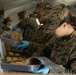 U.S. Marine Corps reservists with MWSS 472 undergo a food inspection for the Major General William Pendleton Thompson Hill Food Service Award