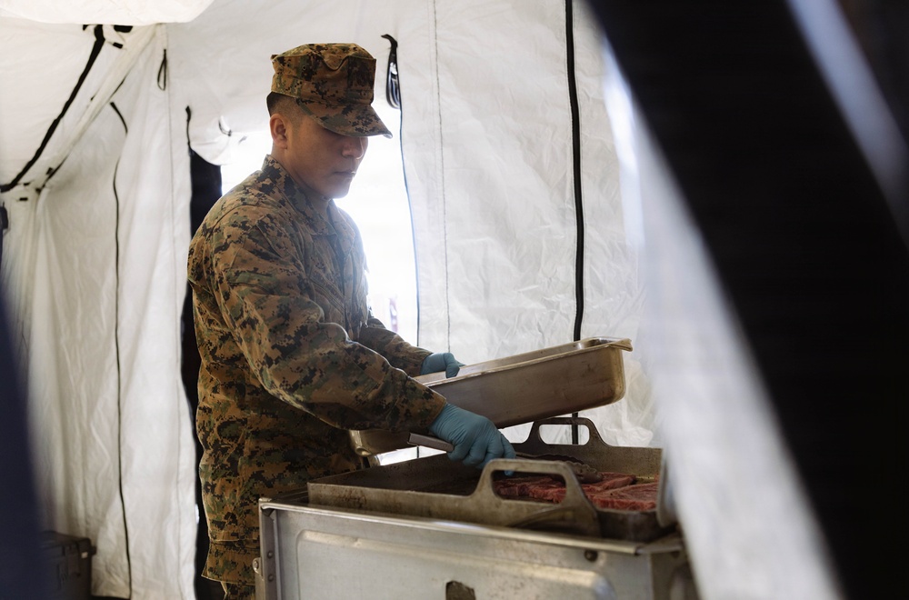 U.S. Marine Corps reservists with MWSS 472 undergo a food inspection for the Major General William Pendleton Thompson Hill Food Service Award