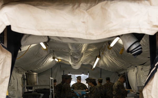 U.S. Marine Corps reservists with MWSS 472 undergo a food inspection for the Major General William Pendleton Thompson Hill Food Service Award